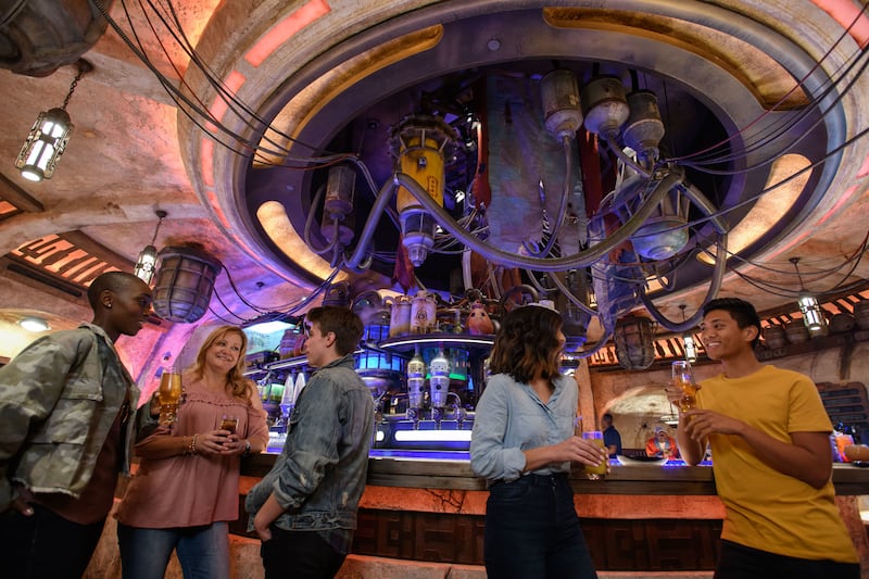 When guests visit Star Wars: Galaxy’s Edge at Disneyland Park in Anaheim, California, and at Disney's Hollywood Studios in Lake Buena Vista, Florida, they’ll be able to enjoy Oga’s Cantina – a local watering hole to unwind, conduct business and maybe even