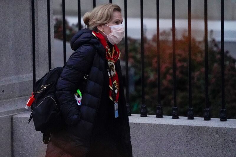 Dr. Deborah Birx, White House coronavirus response coordinator, leaves the White House Tuesday, Dec. 1, 2020, in Washington.