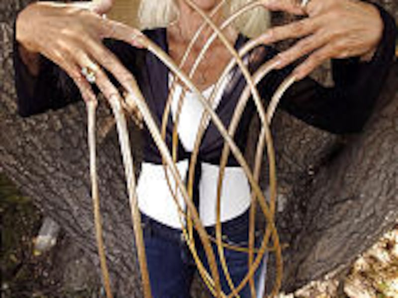 Lee Redmond shows off her nails. In late September, she will help Guinness promote its latest book.