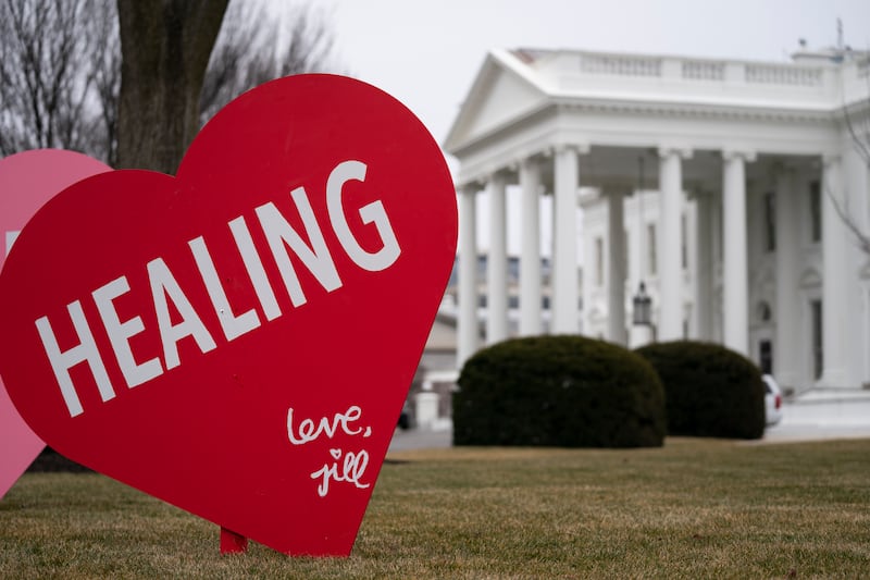 A Valentine’s Day decoration, signed by first lady Jill Biden, sits on the North Lawn of the White House, Friday, Feb. 12, 2021, in Washington.