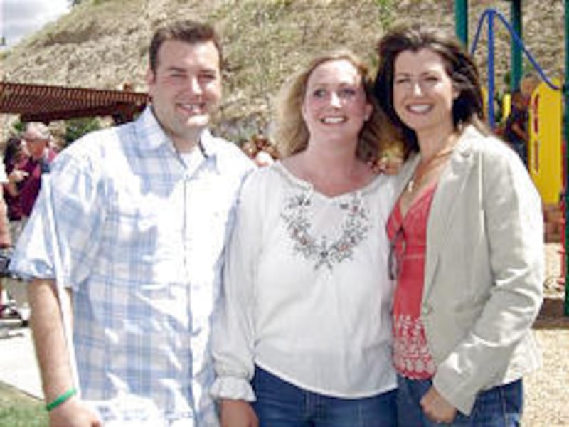 Brandon and Nicole Rasmussen join "Three Wishes' host Amy Grant, right, in Cedar City.