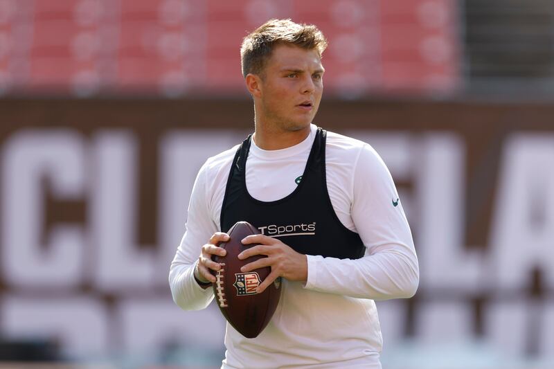New York Jets quarterback Zach Wilson (2) warms up before an NFL football game against the Cleveland Browns, Sunday, Sept. 18, 2022, in Cleveland.