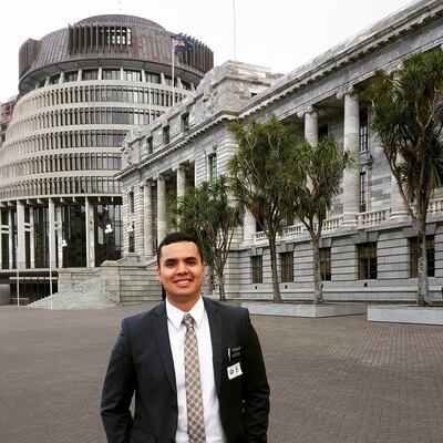 Maurice Melligan stands in front of the "Beehive" Parliament Building in Wellington, New Zealand. Melligan served a mission as a Public Affairs Specialist for the Mormon Newsroom Pacific traveling with scholars speaking on religious toleration and freedom