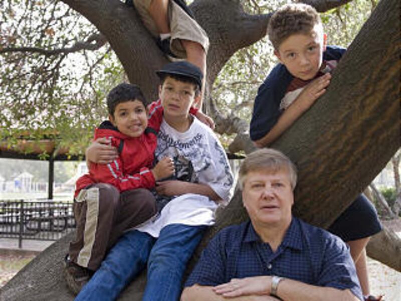 Ken Richey, bottom right, with four of his five adopted boys who are all siblings. Top, D.J. Buckmaster-Richey, 14, Kody Buckmaster-Richey, 6, Alex Buckmaster-Richey, 13, and Daniel Buckmaster-Richey, 11, at Spruck Park in Foothill Farms on Nov. 11, 2009.