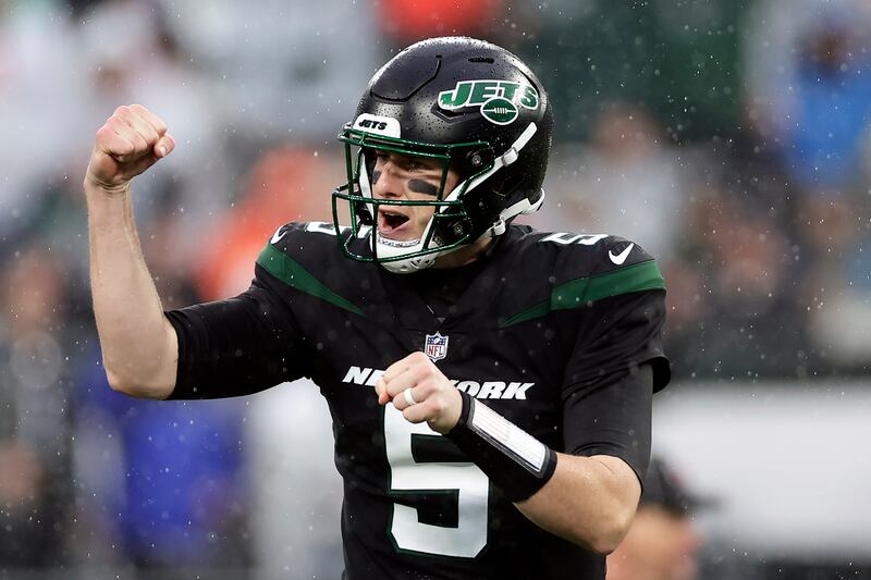 New York Jets quarterback Mike White (5) reacts to a touchdown against the Chicago Bears during an NFL football game Sunday, Nov. 27, 2022, in East Rutherford, N.J.
