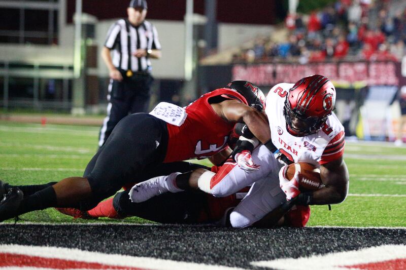 Utah running back Zack Moss runs into the end zone during the game Saturday, Sept. 8, 2018, at Huskie Stadium in DeKalb, Ill.