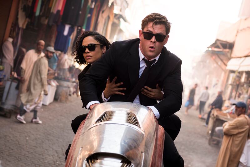 Chris Hemsworth (H) with M (Tessa Thompson) in Marrakech, Morocco, in “Men in Black: International.”
