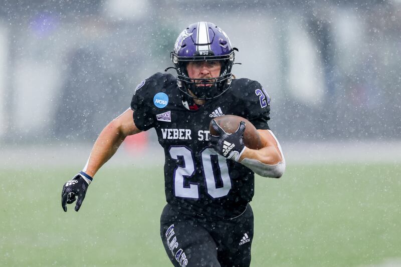 Weber State’s Josh Davis runs during the Wildcats’ first round FCS playoff game against North Dakota on Saturday, November 26, 2022, at Stewart Stadium in Ogden, Utah.