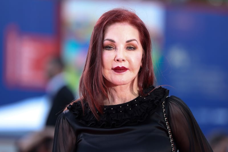 Priscilla Presley poses for photographers upon arrival for the premiere of the film ‘Priscilla’ during the 80th edition of the Venice Film Festival in Venice, Italy.