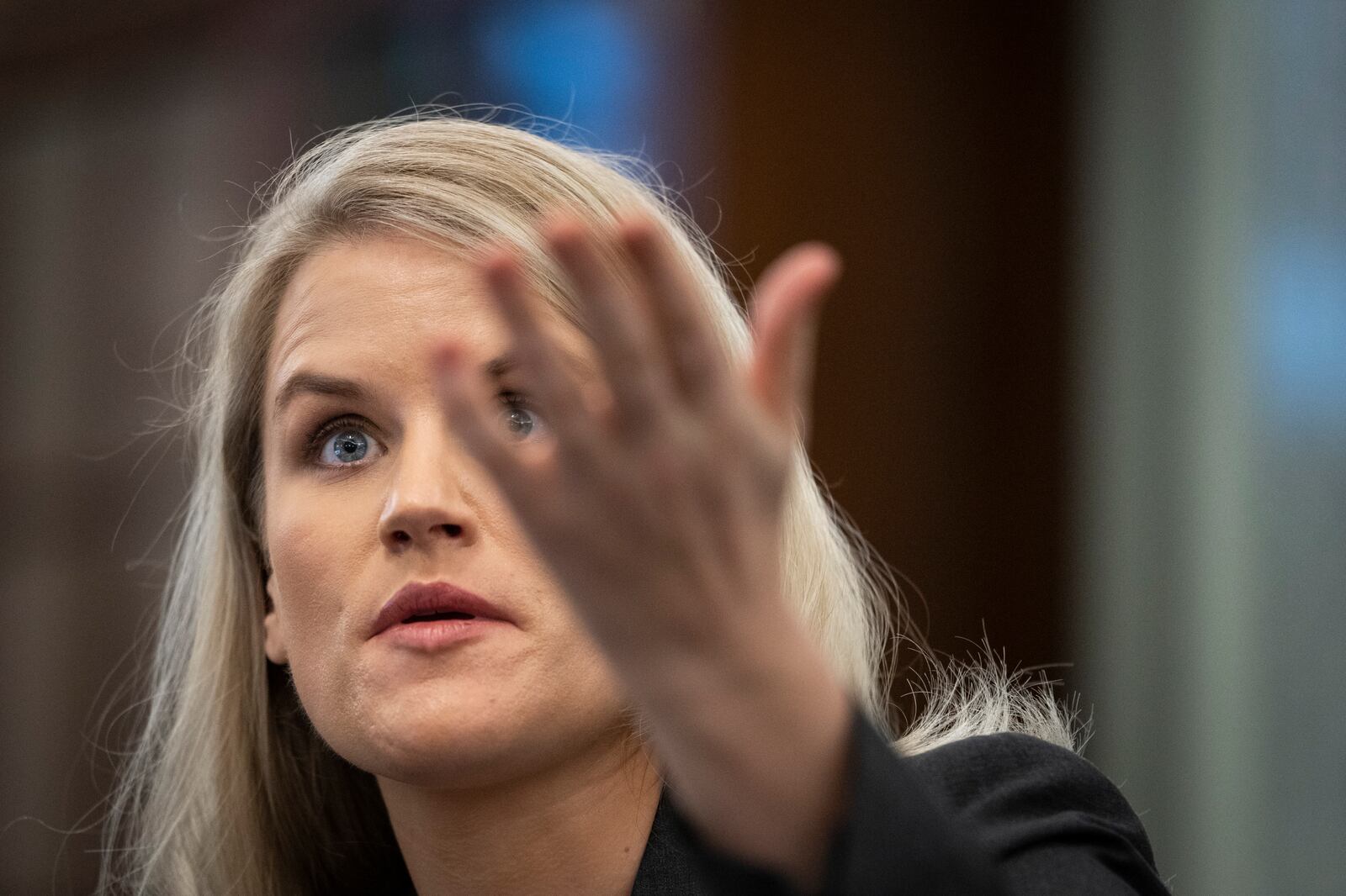 Former Facebook employee and whistleblower Frances Haugen testifies during a Senate hearing.