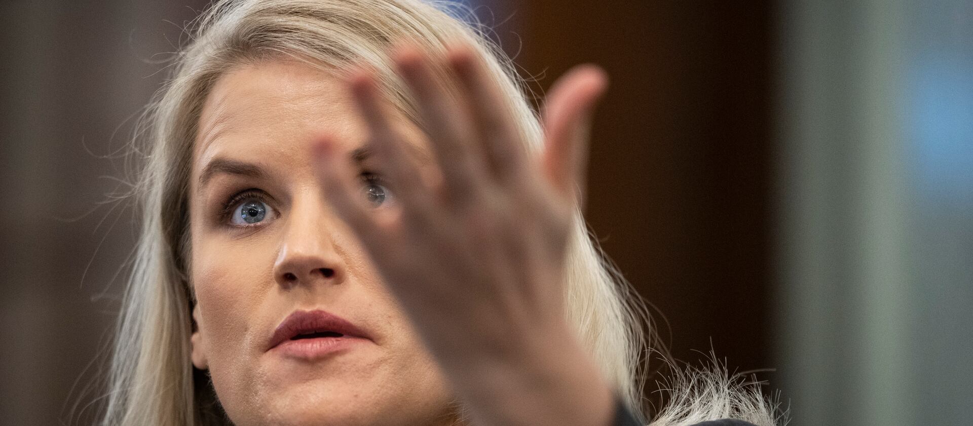 Former Facebook employee and whistleblower Frances Haugen testifies during a Senate hearing.