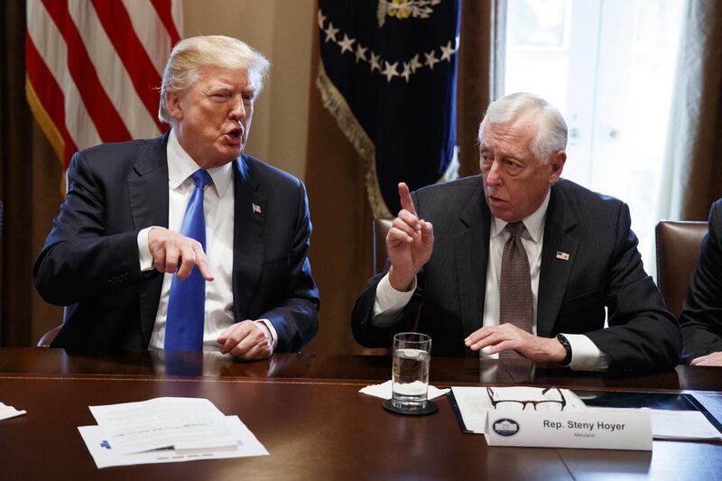 President Donald Trump speaks with Rep. Steny Hoyer, D-Md., during a meeting with lawmakers on immigration policy, Tuesday, Jan. 9, 2018, in Washington. (AP Photo/Evan Vucci)