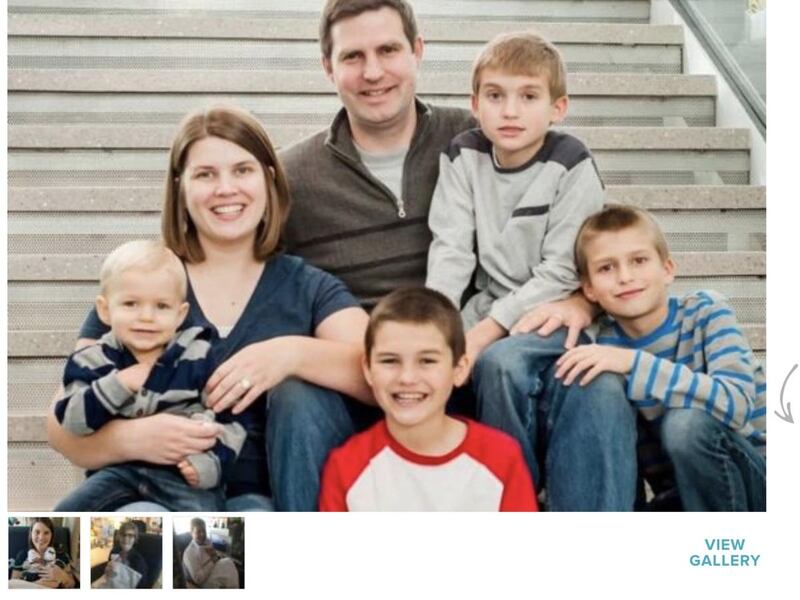 Jacob and Katie Evans are photographed with their four sons. The couple also has twin newborn daughters who are still in the hospital after being born premature.