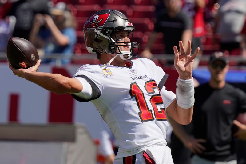 Tampa Bay Buccaneers quarterback Tom Brady warms up Sunday, Oct. 9, 2022, in Tampa, Fla.