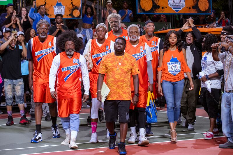 Chris Webber, left, as Preacher, Nate Robinson as Boots, Lisa Leslie as Betty Lou, Shaquille O’Neal as Big Fella, Lil Rel Howery as Dax, Kyrie Irving as Uncle Drew, Reggie Miller as Lights and Erica Ash as Maya in "Uncle Drew."