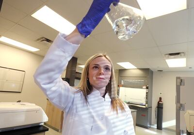 PolarityTE's Ashley Allphin mixes chemicals at the lab in Salt Lake City on Tuesday, Jan. 15, 2019. PolarityTE was founded in Utah less than two years ago with two employees, and has now grown to over 200.