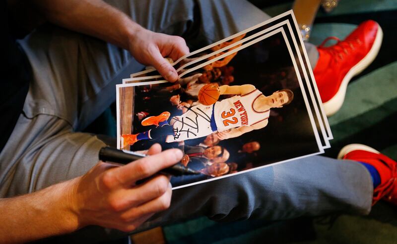 Jimmer Fredette signs autographs in Shanghai, China, on Jan. 18, 2018. Fredette is a former BYU Cougar and now plays for the Shanghai Sharks in the Chinese Basketball Association.