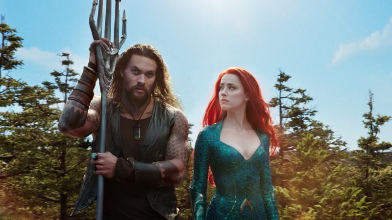 Jason Momoa as Aquaman and Amber Heard as Mera in Warner Bros. Pictures’ action adventure “Aquaman.”