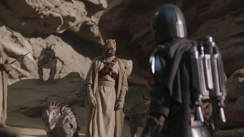 Tusken Raiders and the Mandalorian (Pedro Pascal) in “The Mandalorian” season 2.