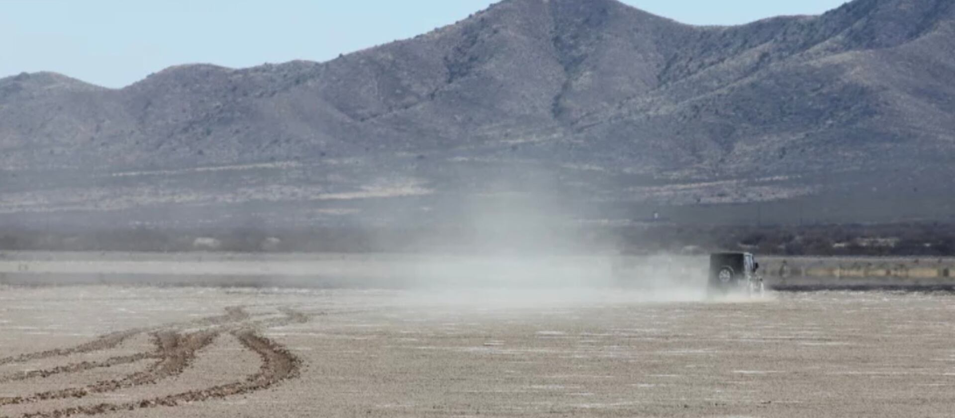 An undated photo of dust picked up by the Great Salt Lake by a vehicle illegally driving on the dried lakebed.