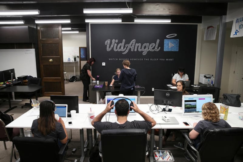 FILE - Employees work at VidAngel's office in Provo on Wednesday, July 20, 2016. A California jury awarded Disney and other Hollywood movie studio plaintiffs $62.4 million on Monday following a trial to assess damages against video filtering service VidAn