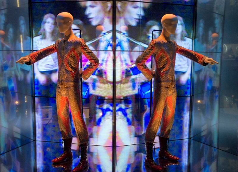 A reflection of the costume that David Bowie wore as Ziggy Stardust on tour is part of a retrospective David Bowie exhibition at the V&A Museum in west London.