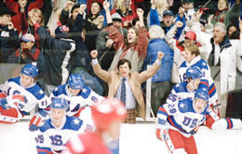Kurt Russell, center, stars in "Miracle," a drama about the 1980 U.S. Men's Hockey Team. The film is being screened Saturday.