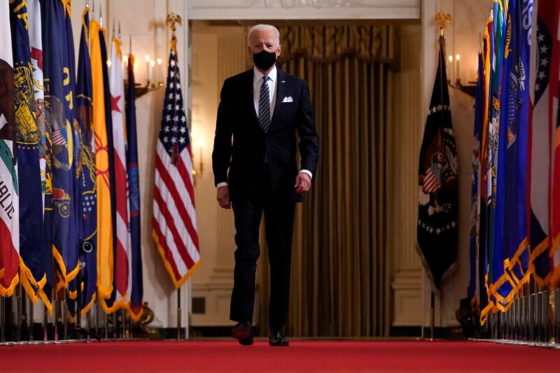 In this March 11, 2021, file photo President Joe Biden arrives to speak about the COVID-19 pandemic during a prime-time address from the East Room of the White House in Washington. Biden will mark his 100th day in office on Thursday, April 29.