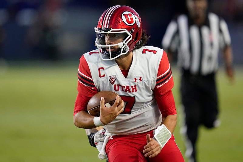 Utah quarterback Cameron Rising looks for yardage during game against San Diego State, Sept. 18, 2021, in Carson, Calif.