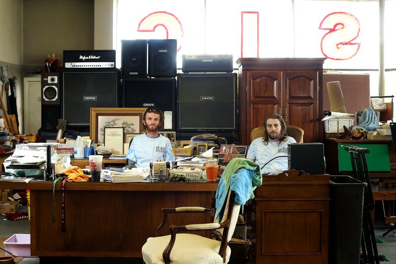 Kade Long and Ford Harris are photographed at Bill Harris Music in Provo on Friday, June 14, 2019.