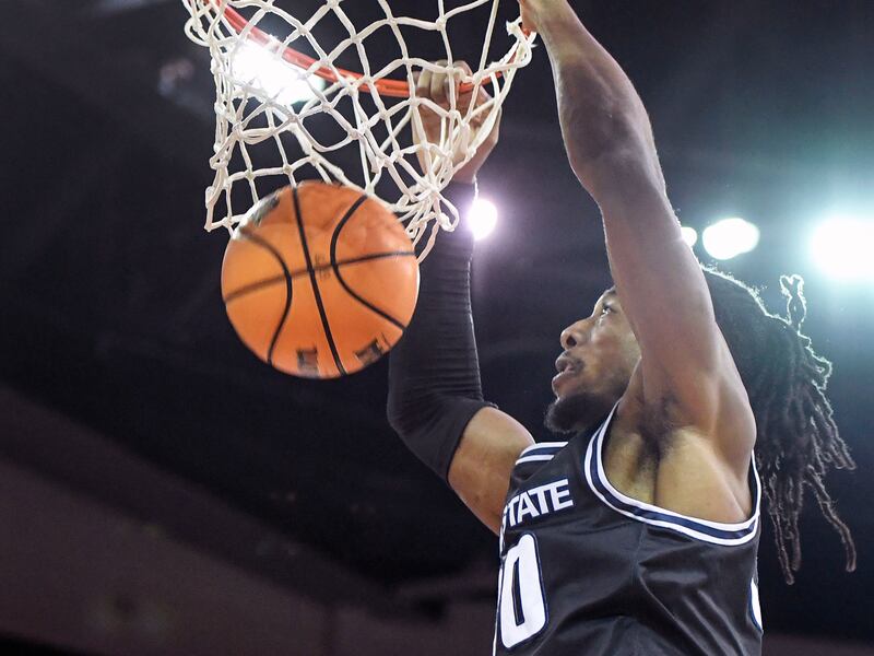 Utah State’s Dan Akin dunks
