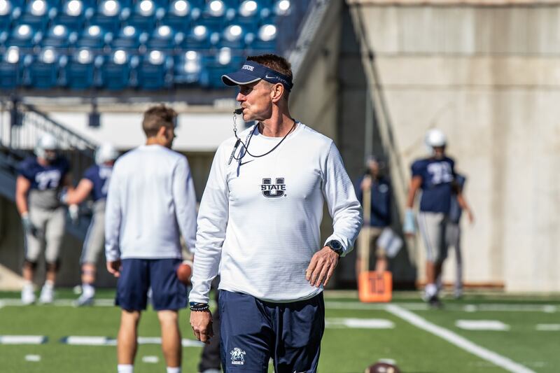 Utah State football coach Gary Andersen. shown in action during spring camp in Logan, is now joining the Weber State staff.