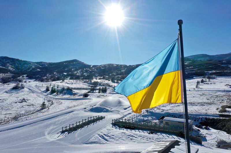 A Ukrainian flag flies over the Soldier Hollow Nordic Center for the 2022 Biathlon Youth and Junior World Championships.