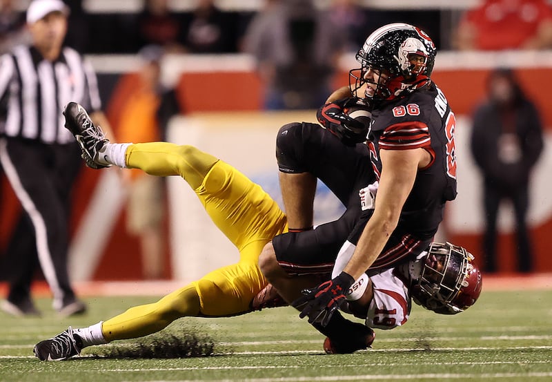 Utah tight end Dalton Kincaid is tackled after a catch during a game against USC at Rice-Eccles Stadium in Salt Lake City.