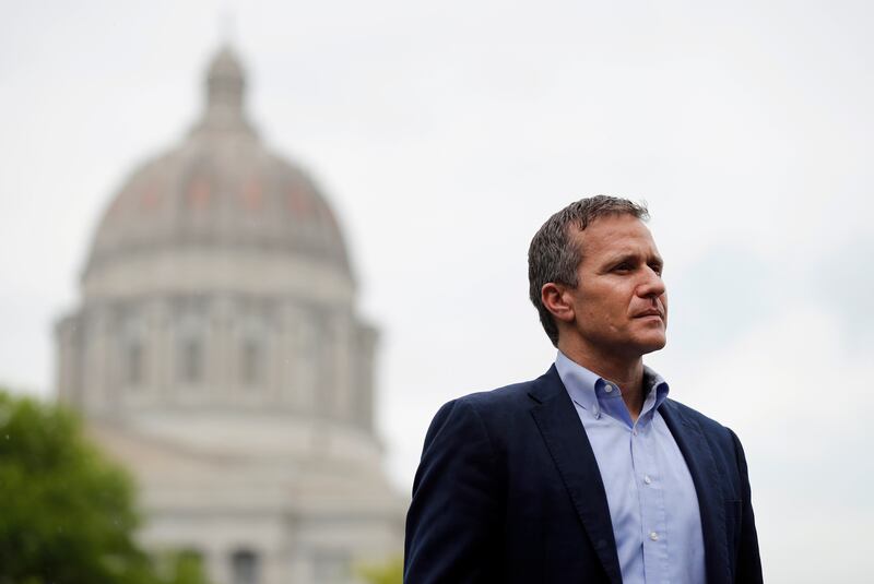 FILE - In this May 17, 2018 file photo, Missouri Gov. Eric Greitens looks on before speaking at an event near the capitol in Jefferson City, Mo. Allegations of sexual misconduct and campaign finance violations against Greitens have been shared with federa
