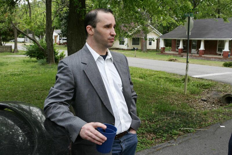 James E. Dutschke stands in the steet near his home in Tupelo, Miss., and waits for the FBI to arrive and search his home Tuesday April 23, 2013 in connection with the recent ricin letters sent to President Barack Obama and Sen. Roger Wicker.