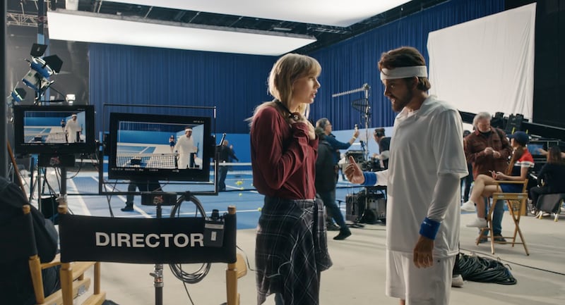 Taylor Swift across from her male alter ego “Tyler Swift,” voiced by Dwayne Johnson, in “The Man.”