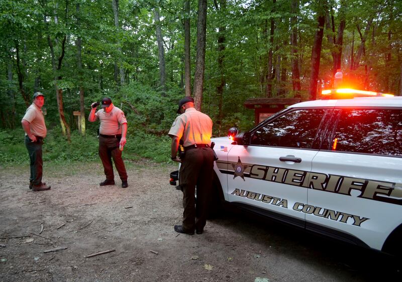 Authorities secure an access point to the rescue operation where a Cessna Citation crashed over mountainous terrain near Montebello, Va., June 4, 2023.