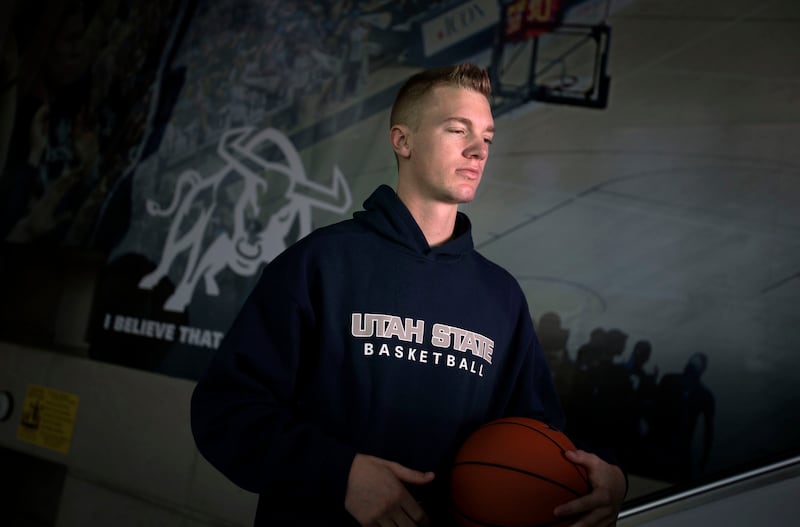 Then-Utah State University basketball player Danny Berger practices in Logan in this December 2012 photo.