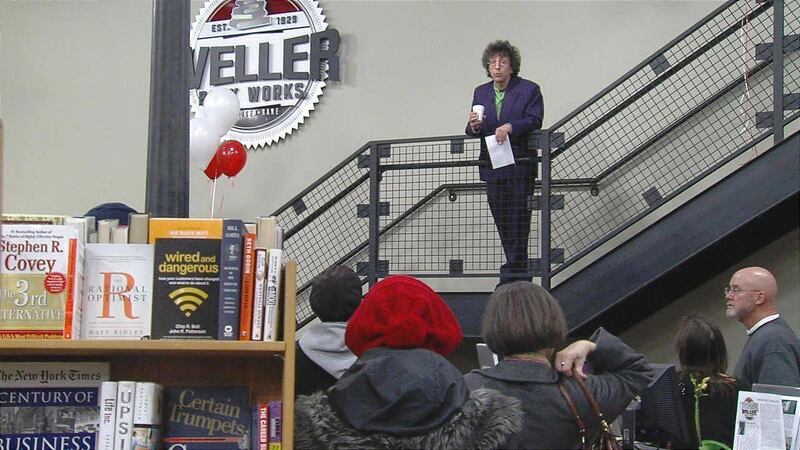 Tony Weller welcomes customers to the grand opening of Weller Book Works in Trolley Square on Friday.