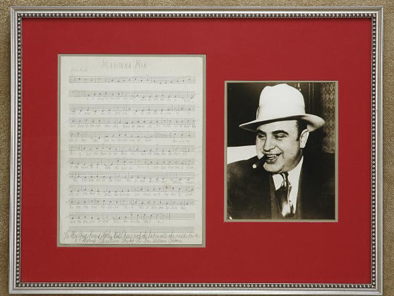 A documents dealer is selling this undated photo of Al Capone and sheet music for his song, "Madonna Mia."