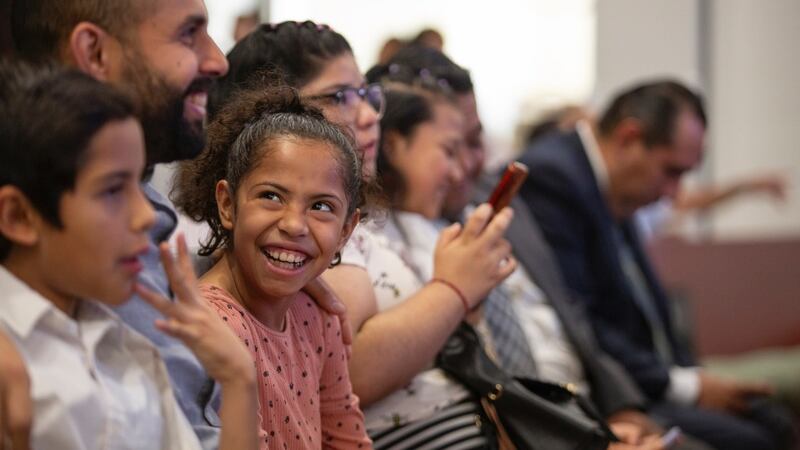Primary children, their parents and leaders gather for a devotional with Sister Amy A. Wright in Mexico City.