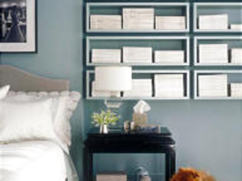 Hanging boxes are a contemporary solution to storing magazines.