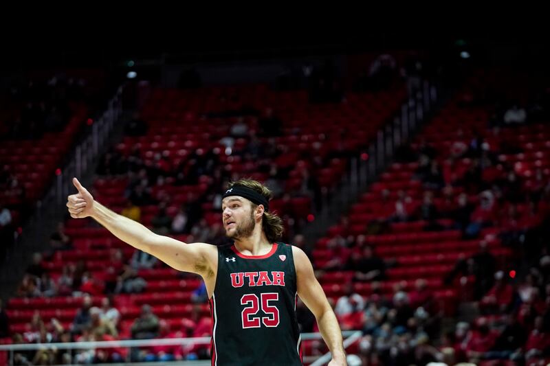 Utah Utes guard Rollie Worster gives a thumbs-up during game against Oregon State at the Huntsman Center in Salt Lake City.