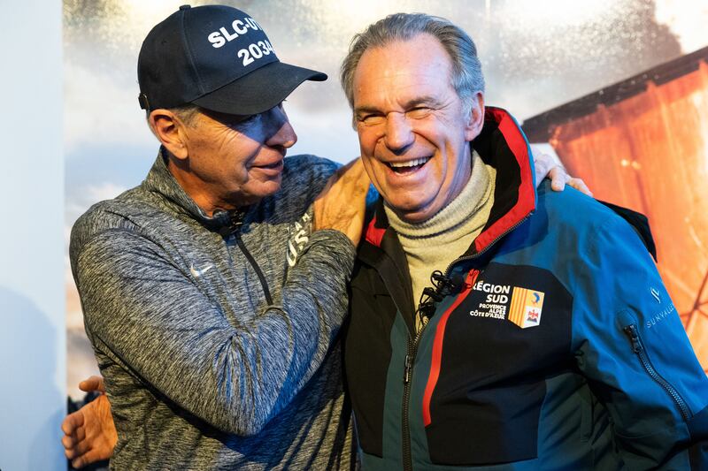 Fraser Bullock, left, CEO of the Salt Lake City-Utah Committee for the Games, and Provence-Alpes-Côte d’Azur Region President Renaud Muselier talk at the Alf Engen Ski Museum in Park City on Jan. 11, 2024.