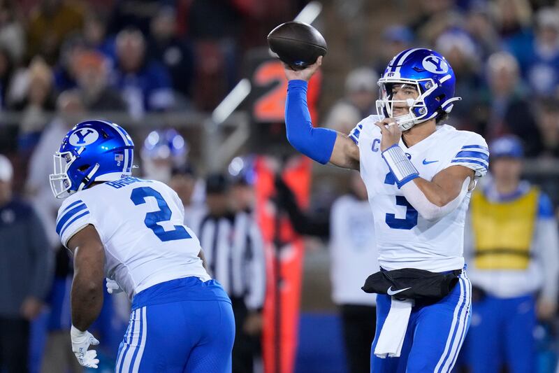 BYU quarterback Jaren Hall (3) throws a pass against Stanford during the first half of an NCAA college football game in Stanford, Calif., Saturday, Nov. 26, 2022.