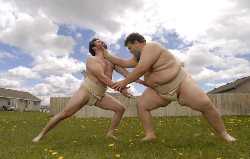 This May 19, 2010 picture shows Kelly Gneiting, right, a 420-pound sumo wrestler, who's been ranked among the top in the world, wrestling with Trent Sabo, a ranked sumo wrestler in the lightweight category in Idaho Falls, Idaho. Gneiting has competed in t