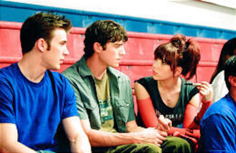 Chris Evans as Kyle, left, Bryan Greenberg as Matty and Scarlett Johansson as Francesca get involved in a high-school scheme to steal answers to SATs in the thuddingly unfunny "The Perfect Score."