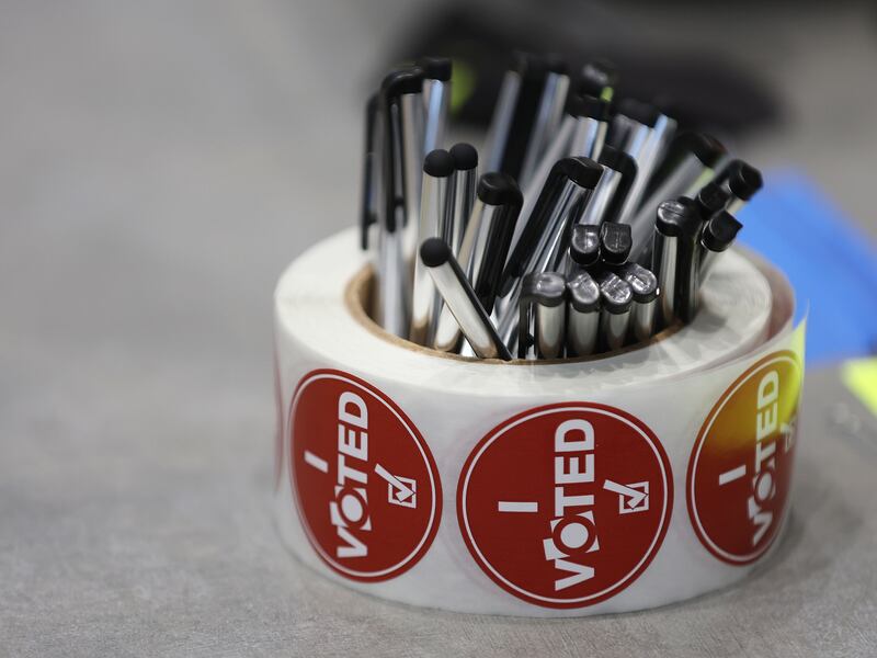 A roll of “I voted” stickers is pictured.