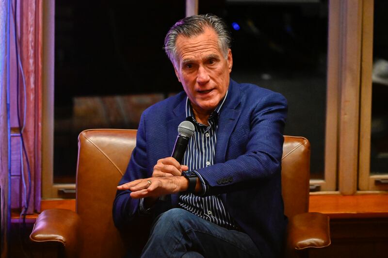 Sen. Mitt Romney, R-Utah, speaks with former Speaker of the House Paul Ryan, R-Wis., during the E2 Summit at Stein Eriksen Lodge on Tuesday, Oct. 10, 2023, in Park City.